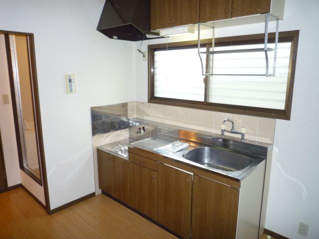 Kitchen. Put a two-burner gas stove kitchen.