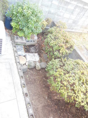 Balcony. It is outside the garden of the window