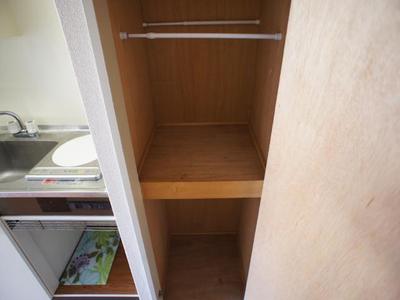 Living and room. There is storage space
