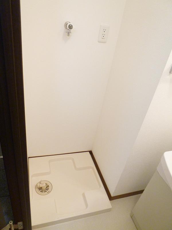 Other Equipment. Washing machine in the room