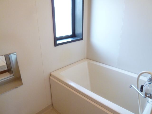 Bath. It is bright and bathrooms in a small window