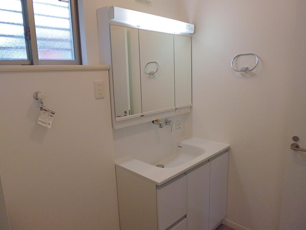 Wash basin, toilet. C Building