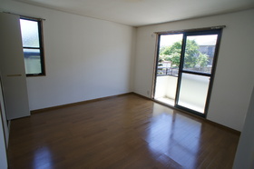 Living and room. It is a corner room.