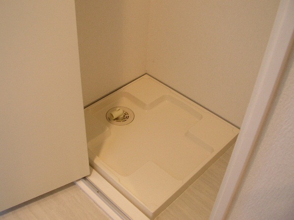 Other Equipment. Washing machine in the room