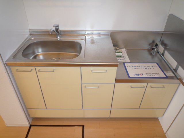 Kitchen. Two-burner gas stove is put kitchen.