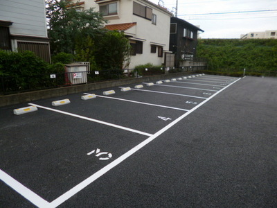 Parking lot. There is ample parking within the site