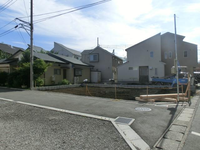 Local photos, including front road. 1 Building