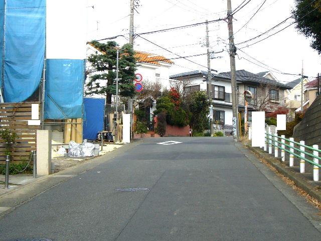 Local photos, including front road. Adjacent road (east 5.5m public road)