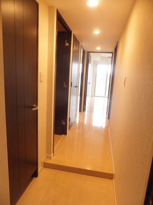 Entrance. There are shoes in closet