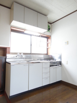 Kitchen. Also easy to kitchen space bright and ventilation have windows