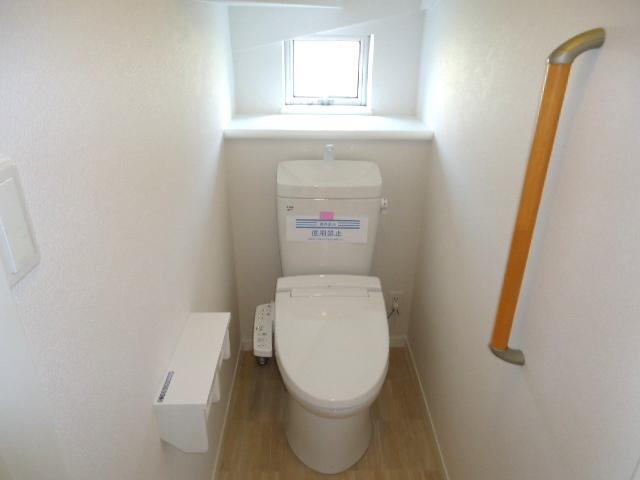 Toilet. A Building Shower toilet seat 1st floor