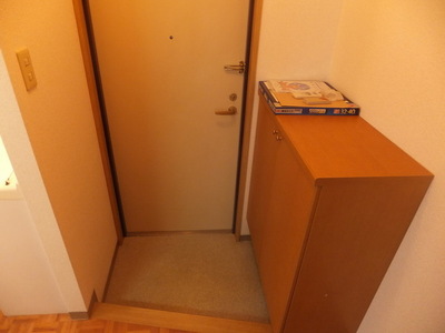 Entrance. There is also a shoe box