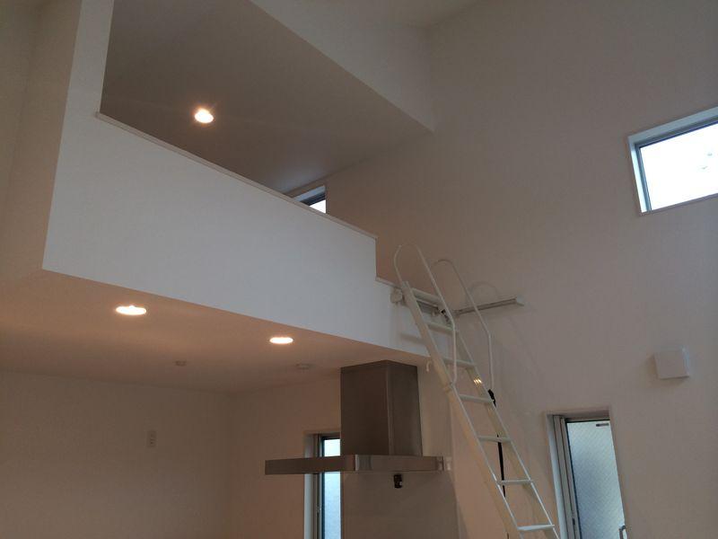 Living. High ceilings and a loft