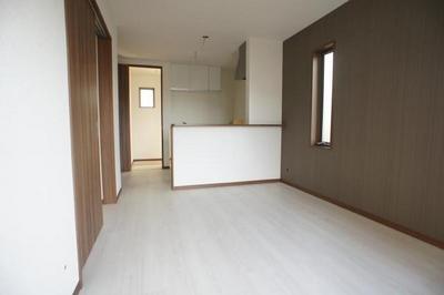 Living and room. White floors and black accent Cross will produce a stylish space!