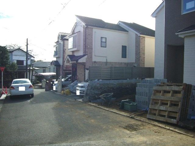 Local photos, including front road. Adjacent road (northeast side 5m public road)