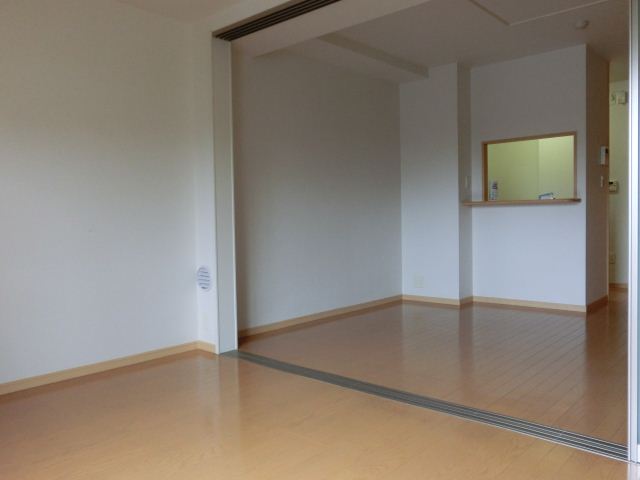 Living and room. It is the earthy colors of the room