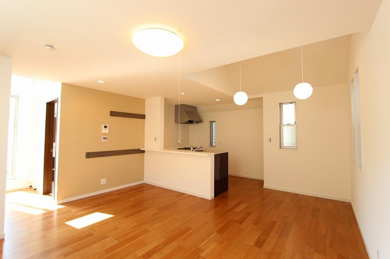 Living. Bright, high-ceiling living diving