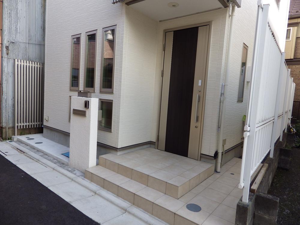 Entrance. Bicycles and motorbikes also put the front door