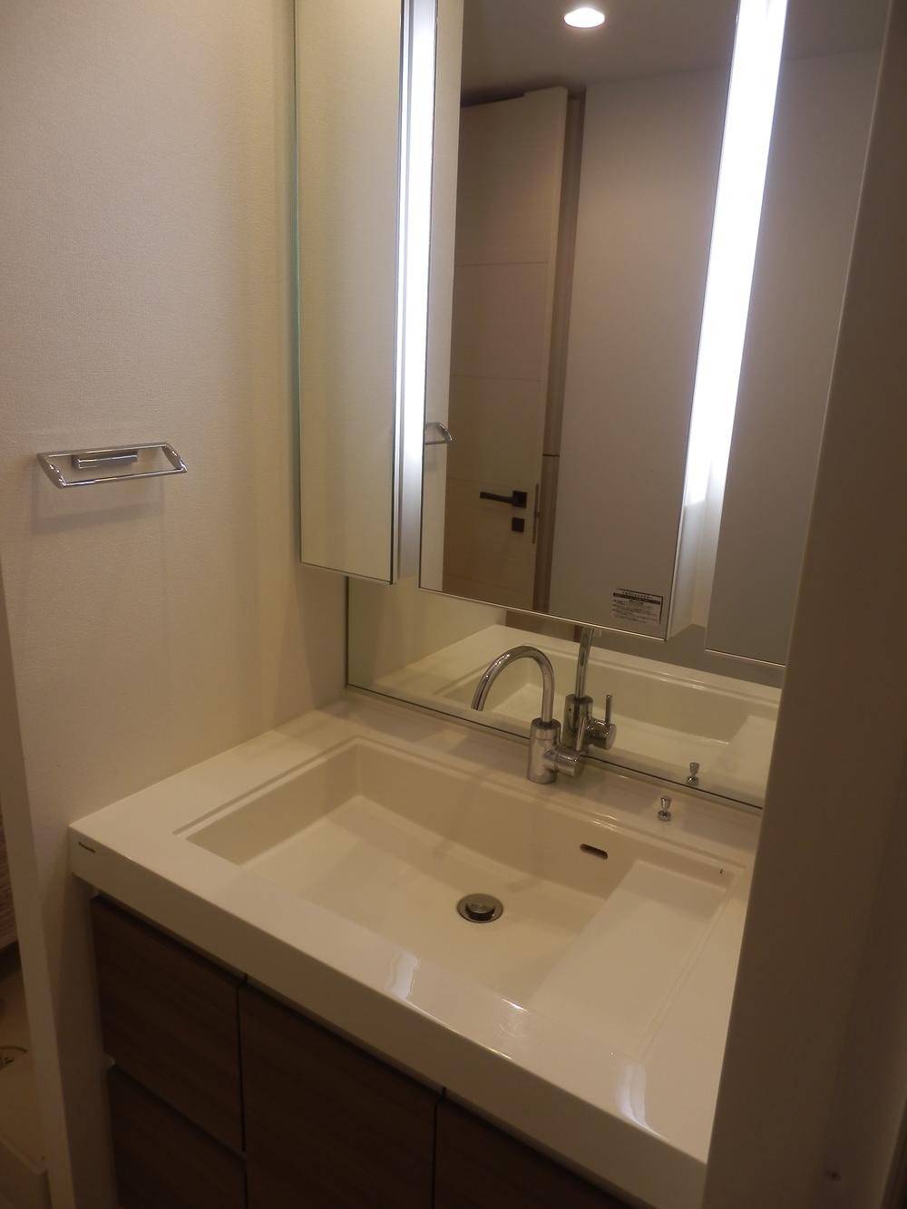 Wash basin, toilet. Bathroom vanity