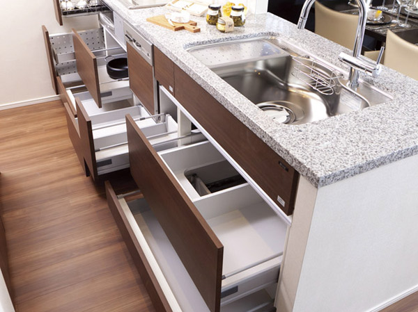 Kitchen.  [Slide storage] Drawn out as far as it will go, It is likely to take out those in the slide storage. Slowly closing soft-close with function.