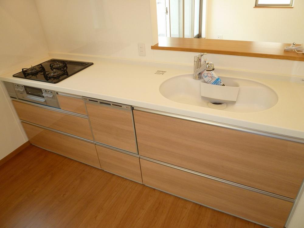 Kitchen. Matsushita Electric Works, Ltd. living station Soft closing mechanism Seismic lock mechanism, Artificial marble gap less sink adoption, With dish washing washing machine, Cleaning Ease glass top stove