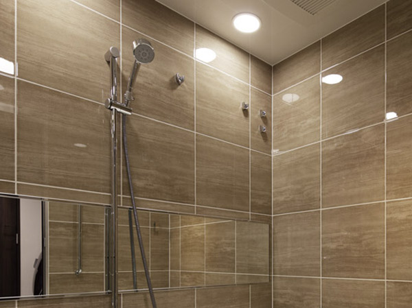 Bathing-wash room.  [Tiled bathroom] On the wall the luxury tile. Lighting and down lights, And finished with a space that is calm.