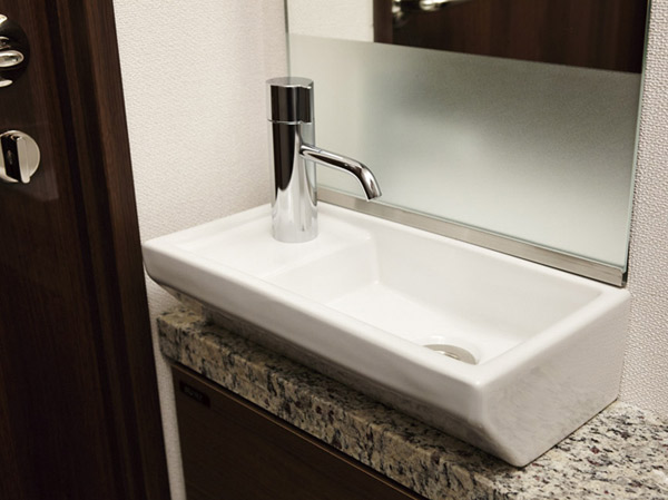 Bathing-wash room.  [Hand wash counter] Friendly sanitary space development, Installed hand washing counter to the toilet. This is useful when a little cleaning.