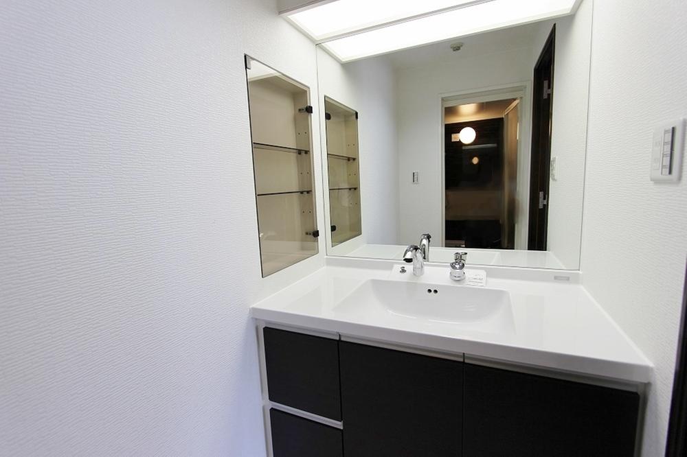 Wash basin, toilet. Water around is also beautiful