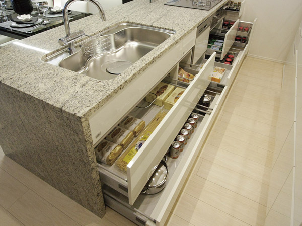 Kitchen.  [All slide storage] The back of the thing and large cookware also taken out smoothly, Adopted sister easy to slide storage.