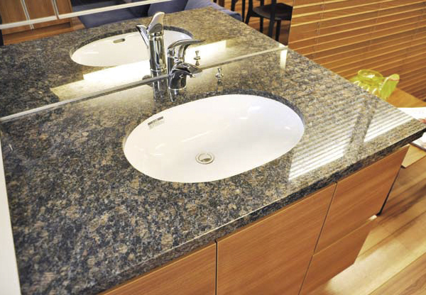 Bathing-wash room.  [Bathroom vanity] Adopt a superior natural stone to durability and hygiene in the bathroom vanity counter. Wash bowl has adopted a simple elliptical basin bowl of, It is a design that beautifully harmonize with the texture of the natural stone counter.