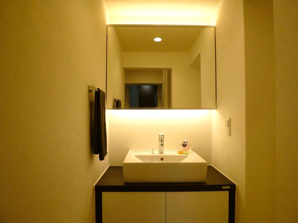 Wash basin, toilet. Stylish bathroom vanity!