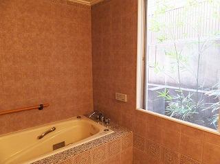 Bathroom. Jacuzzi bath overlooking the green: renovated in about 10 years ago