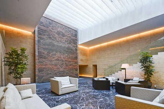 Other common areas. Airy lounge with a vaulted ceiling