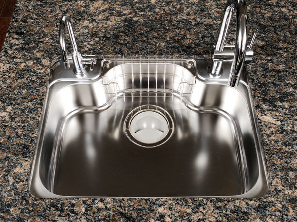 Kitchen.  [Quiet sink] And devised to enhance the silent effect to the sink surface it was difficult to sound the water wings sound.