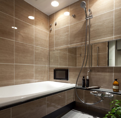 Bathing-wash room.  [Bathroom] Simple outline, Friendly oval tub oval bathtub shape, Gently wraps the body in a soft line, It enhances more comfort at the time of bathing.  ※ Published photograph of the TV will be paid option.