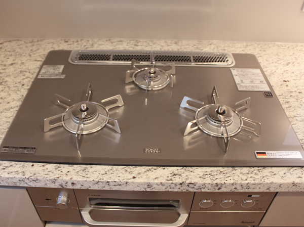 Kitchen. Glass top three neck stove