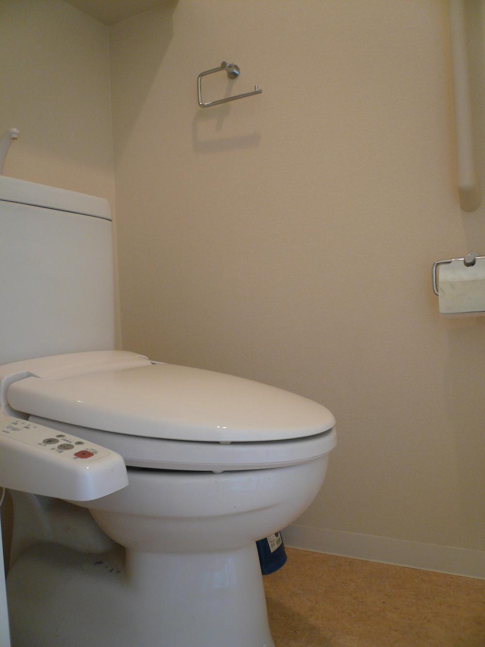 Toilet. Washlet comes with