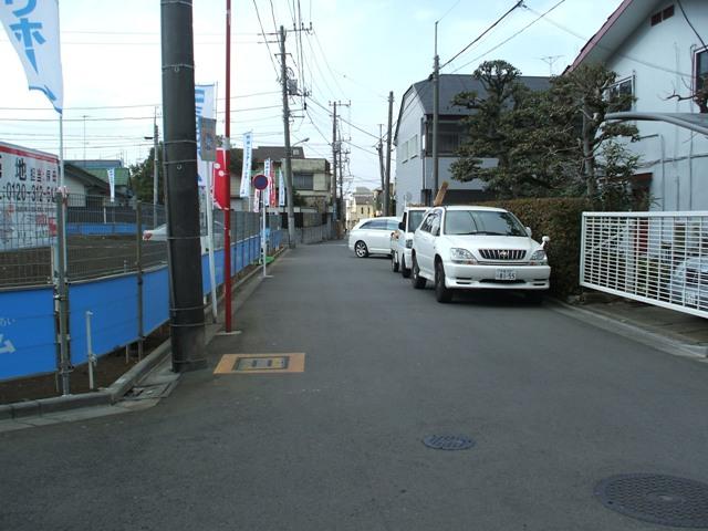 Local photos, including front road. Northeast side 5.6m road