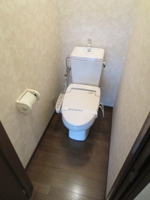 Toilet. It is a photograph of the toilet