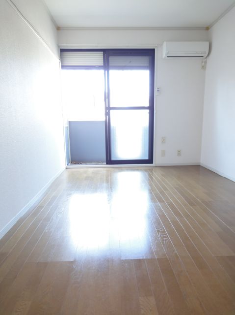 Living and room. It is a bright room.