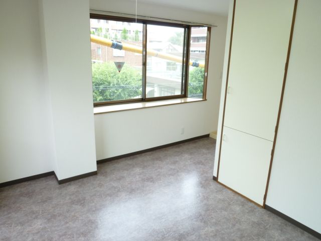 Living and room. With bay windows in the corner room