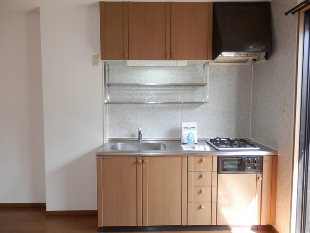 Kitchen. ◆ System kitchen ・ Two-burner is equipped with stove grill ◆