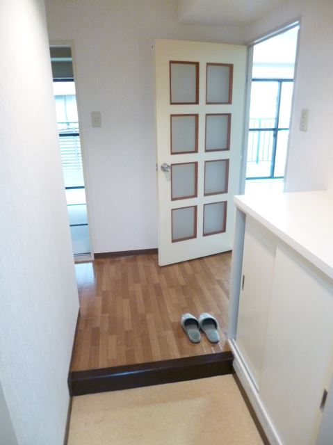 Entrance. With a shoe box