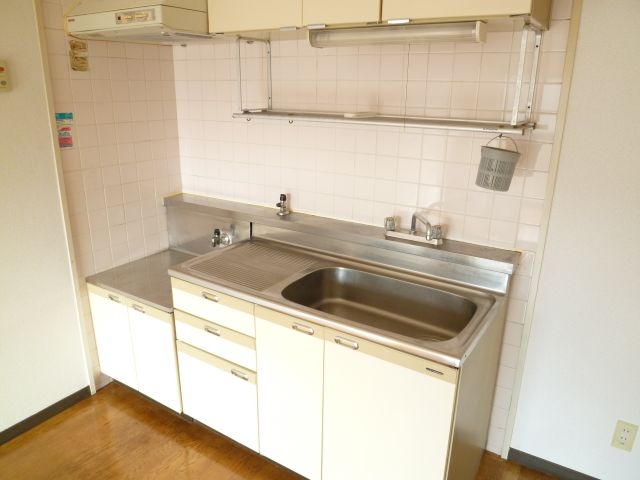 Kitchen. Put a two-burner gas stove kitchen.