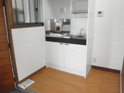 Other room space. Spacious kitchen around