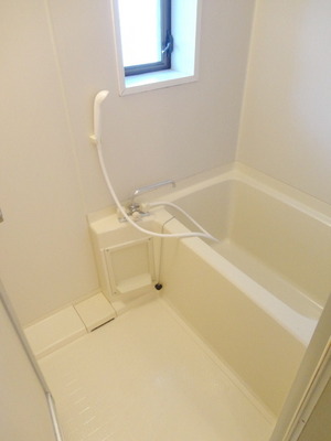 Bath. There is a window in the bathroom