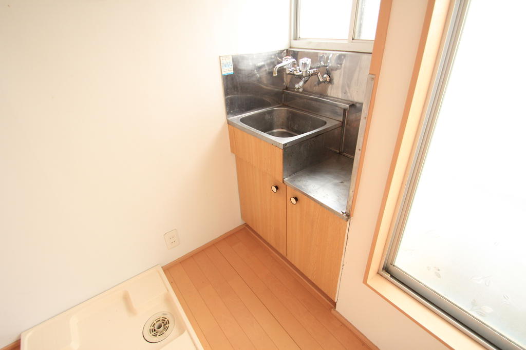 Kitchen. Kitchen next to the indoor washing machine Storage