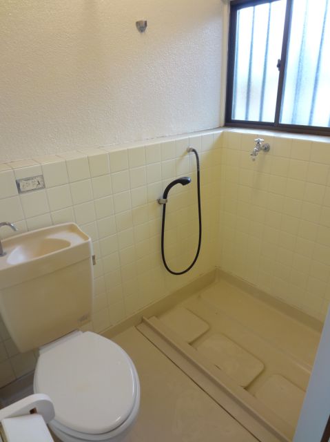 Toilet. Shower and toilet integrated Water is for washing machine