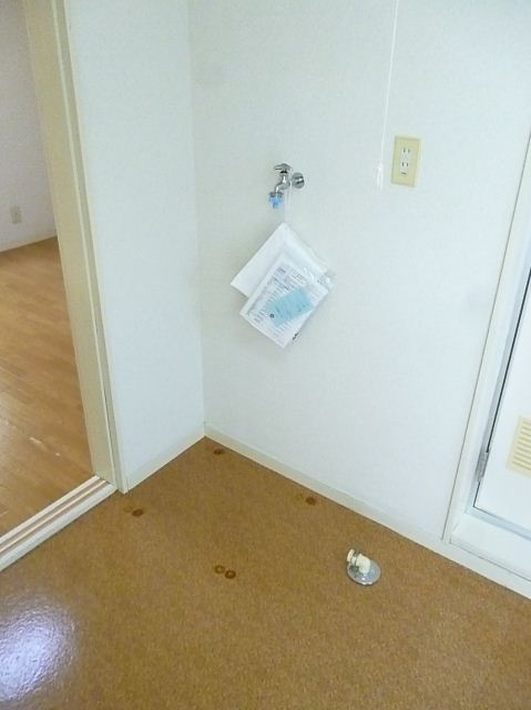 Other. Washing machine is put in a room.