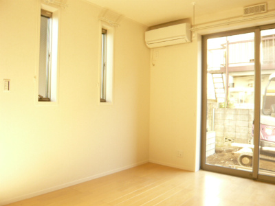 Living and room. It is a corner room!